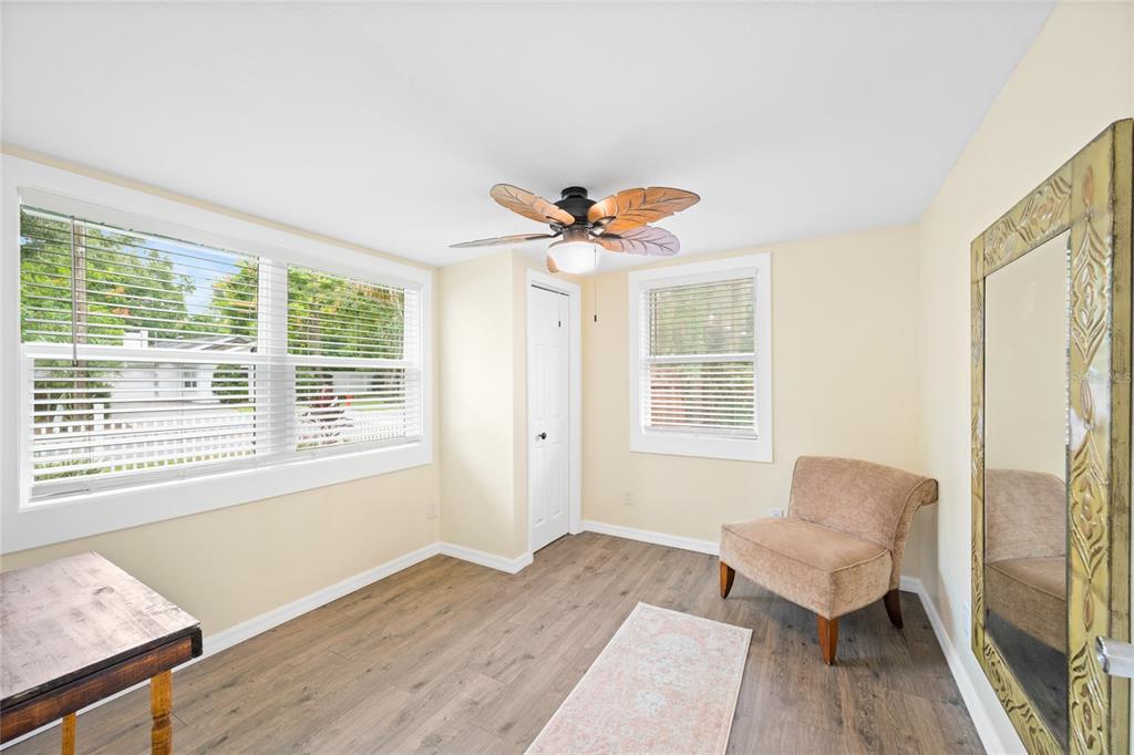245 South Rhodes Street Mount Dora, FL 32757 - Photo 24 of 38 a living room with furniture and a window