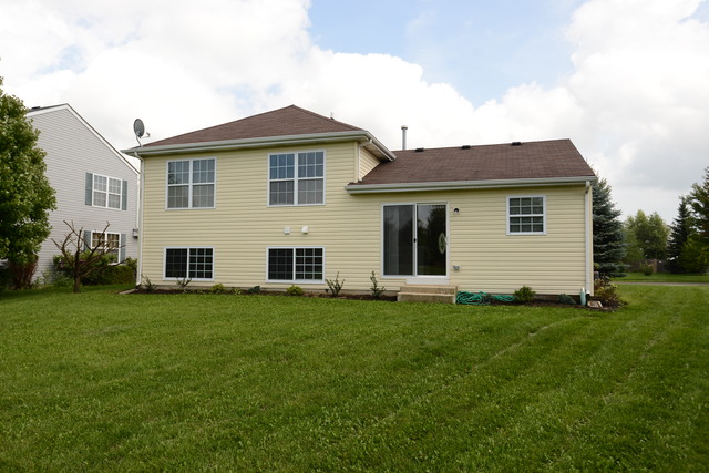 528 Wynbrooke Road Romeoville, IL 60446 - Photo 24 of 25 a view of a house with a yard