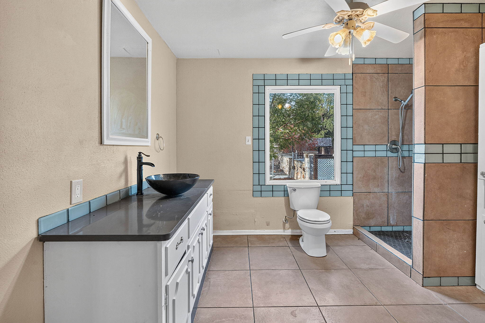 3809 Wyldwood Road Austin, TX 78739 - Photo 39 of 40 Tiled flooring and a walk-in shower define this functional bathroom layout.