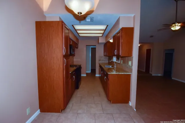 a view of living room and kitchen
