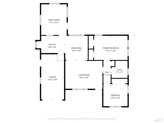 a patio with table and chairs