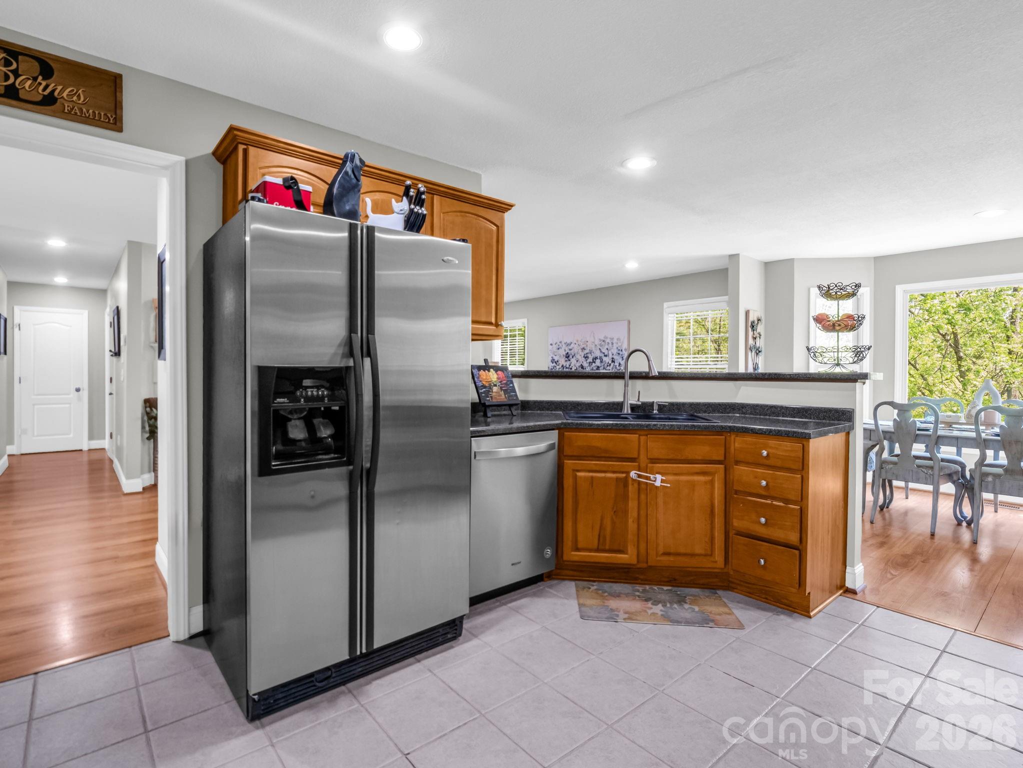 158 Shady Woods Lane Rutherfordton, NC 28139 - Photo 12 of 41 a kitchen with stainless steel appliances granite countertop a refrigerator and a sink
