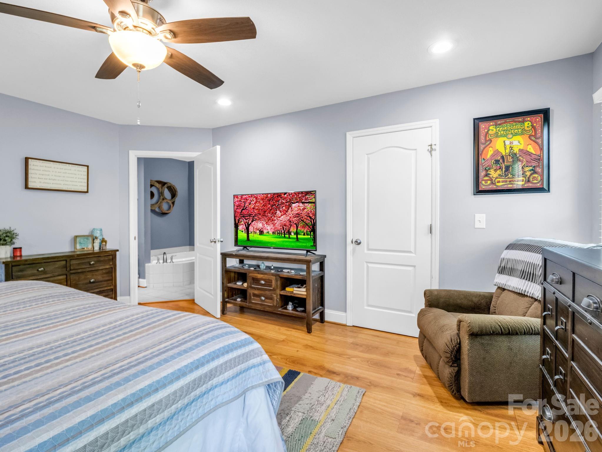 158 Shady Woods Lane Rutherfordton, NC 28139 - Photo 20 of 41 a bedroom with furniture and a flat screen tv