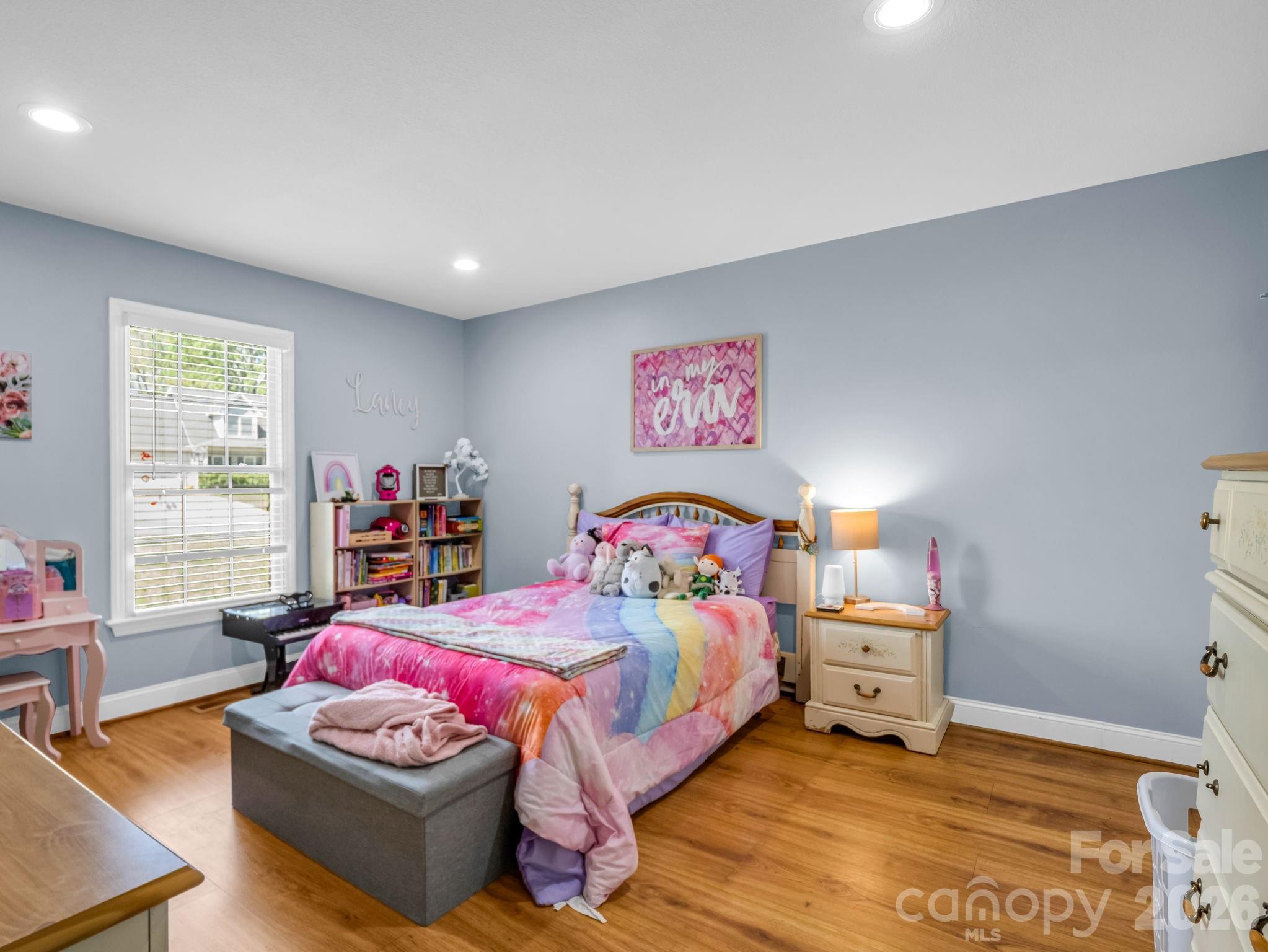158 Shady Woods Lane Rutherfordton, NC 28139 - Photo 23 of 41 a bedroom with furniture and a large window