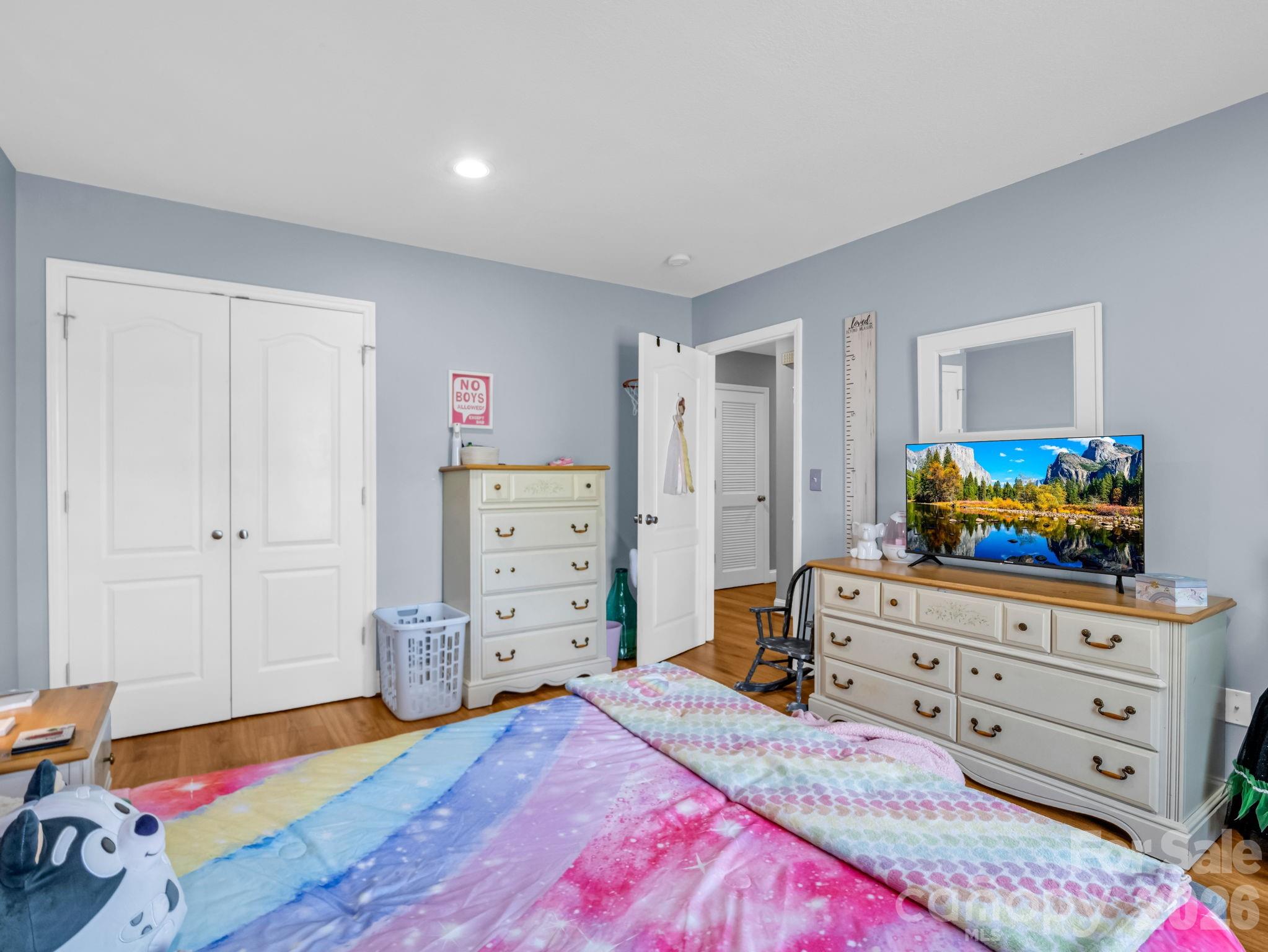 158 Shady Woods Lane Rutherfordton, NC 28139 - Photo 24 of 41 a bedroom with a bed and a dresser