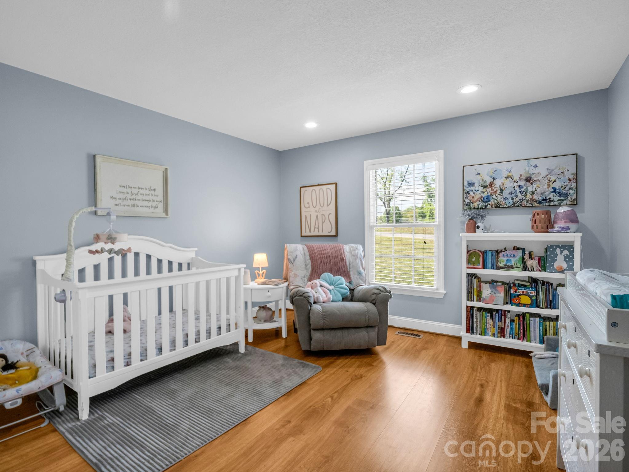 158 Shady Woods Lane Rutherfordton, NC 28139 - Photo 25 of 41 a bedroom with furniture and a book shelf