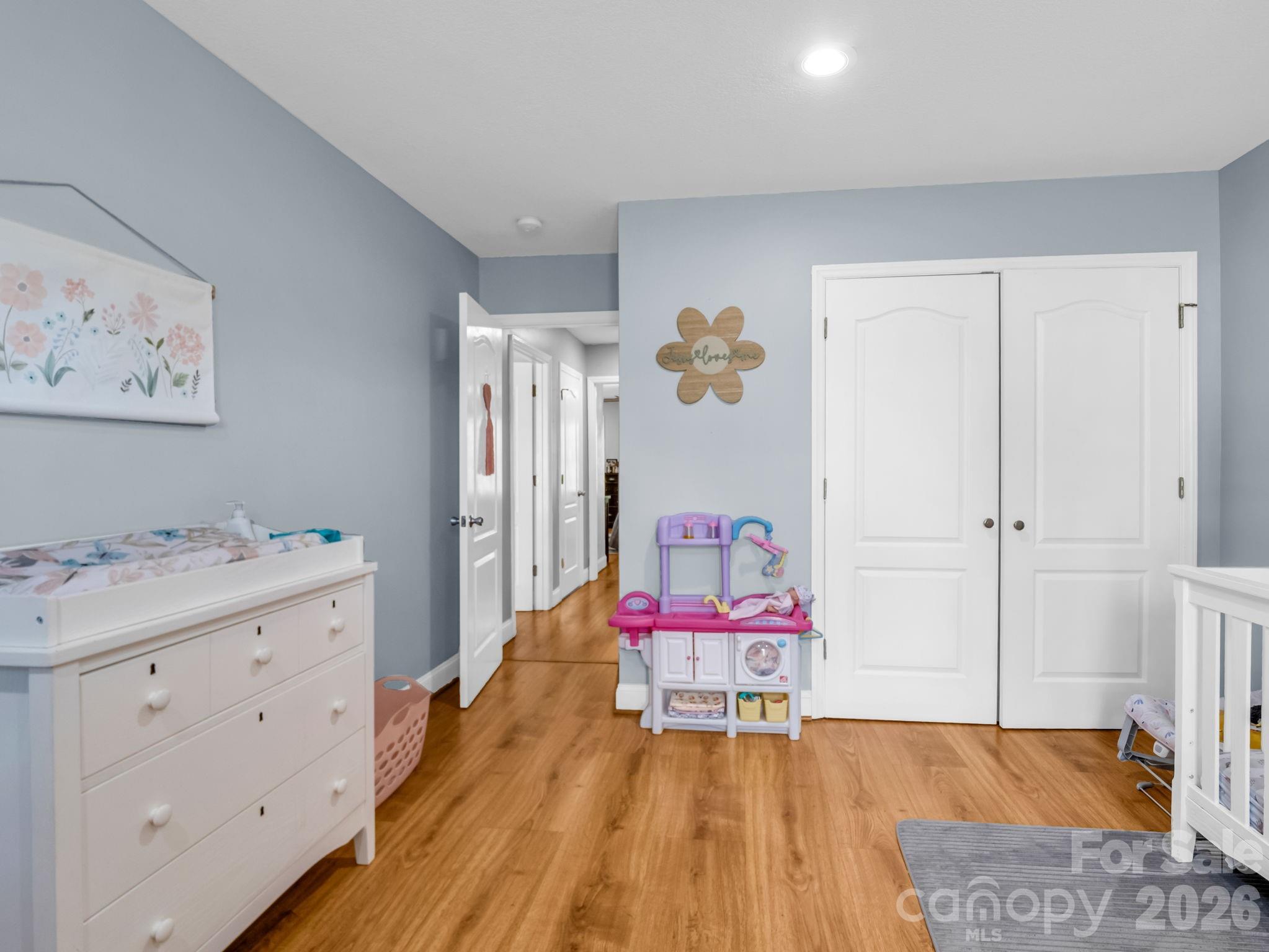 158 Shady Woods Lane Rutherfordton, NC 28139 - Photo 26 of 41 a bedroom with a bed and wooden floor