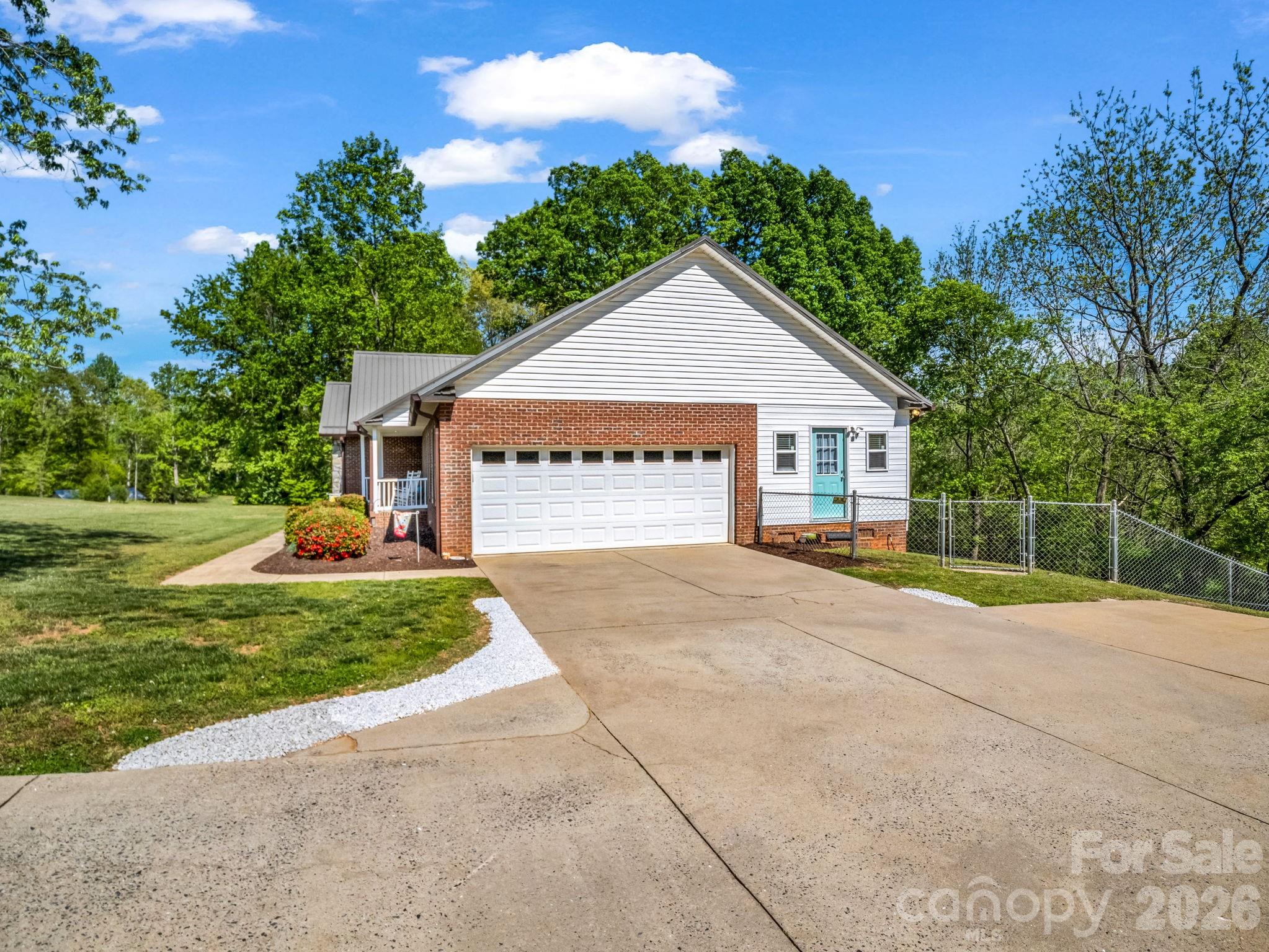 158 Shady Woods Lane Rutherfordton, NC 28139 - Photo 31 of 41 a view of a house with backyard and garden