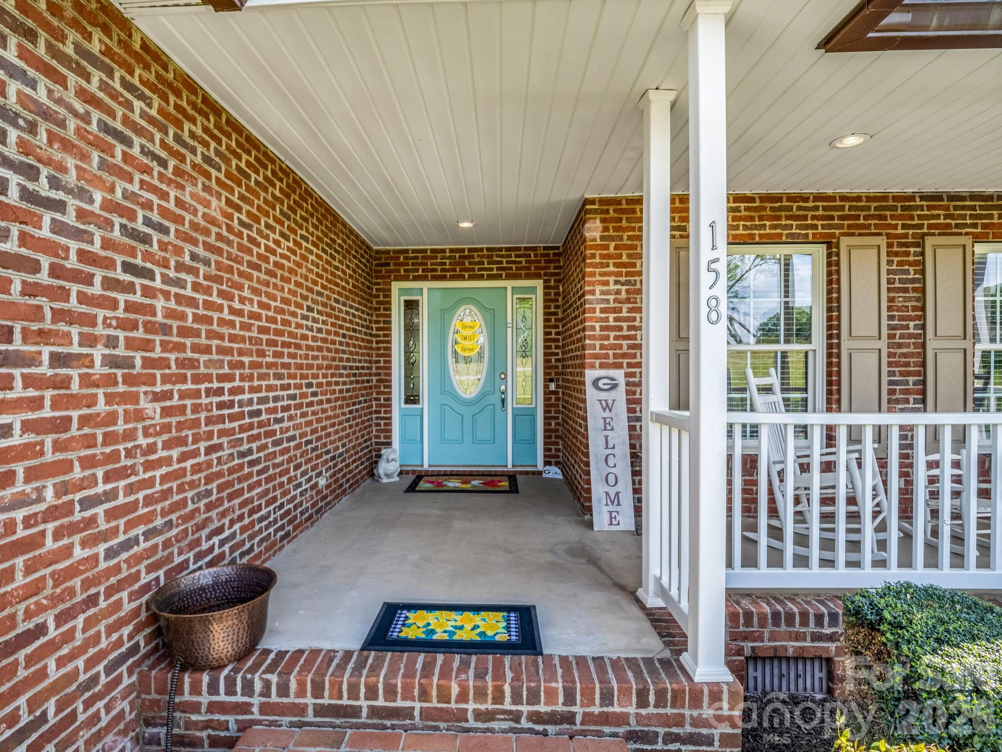 158 Shady Woods Lane Rutherfordton, NC 28139 - Photo 33 of 41 a view of an entryway with a wooden fence