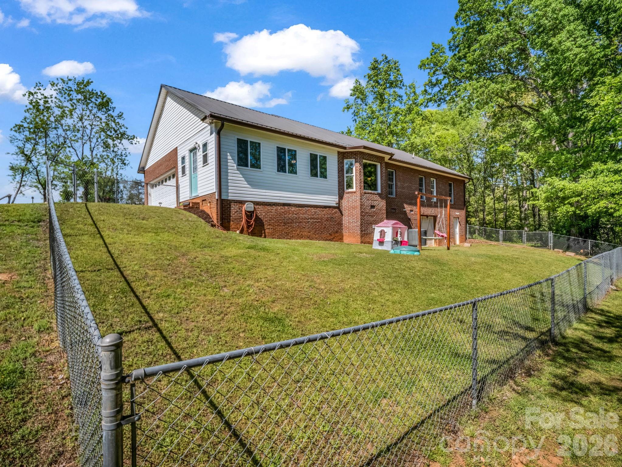 158 Shady Woods Lane Rutherfordton, NC 28139 - Photo 38 of 41 a view of a house with pool
