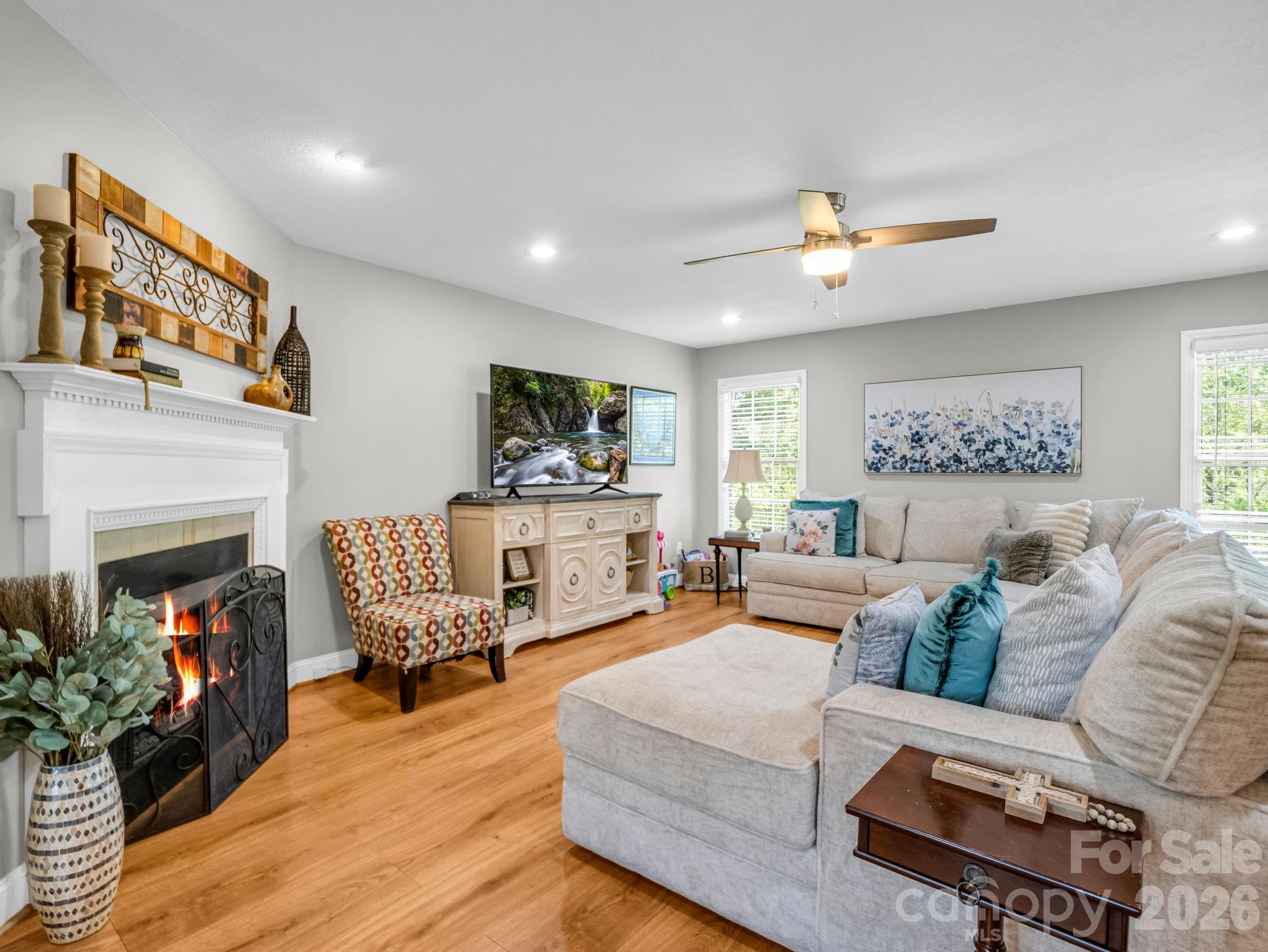 158 Shady Woods Lane Rutherfordton, NC 28139 - Photo 5 of 41 a living room with furniture and a fireplace