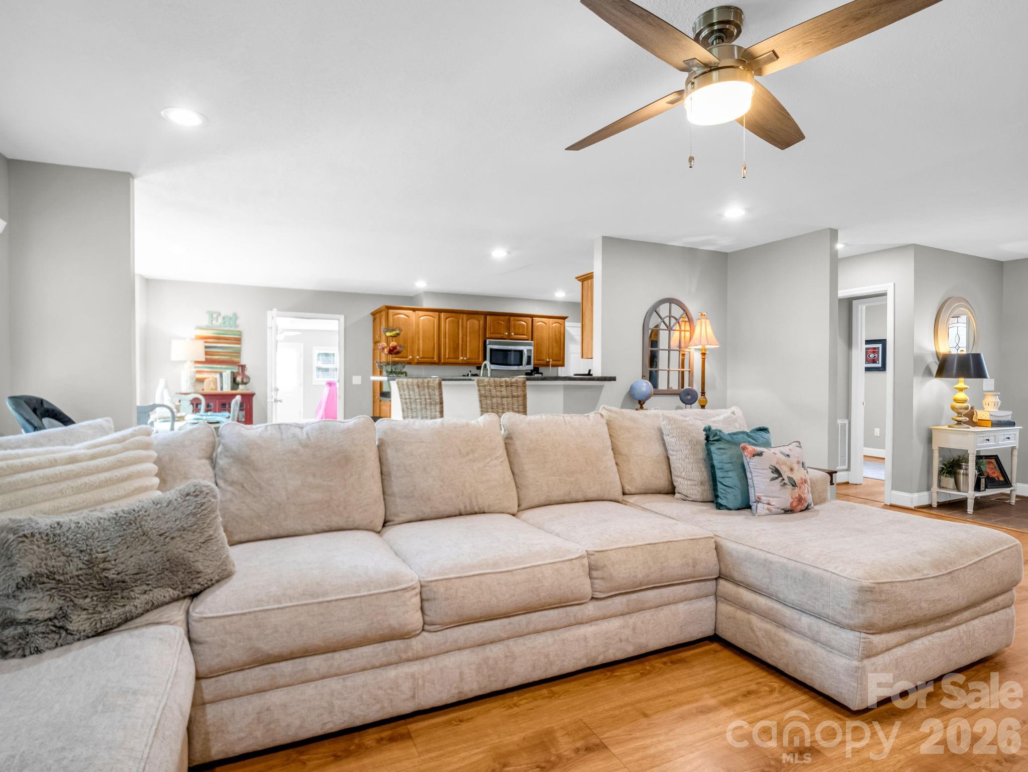 158 Shady Woods Lane Rutherfordton, NC 28139 - Photo 6 of 41 a living room with furniture and a chandelier