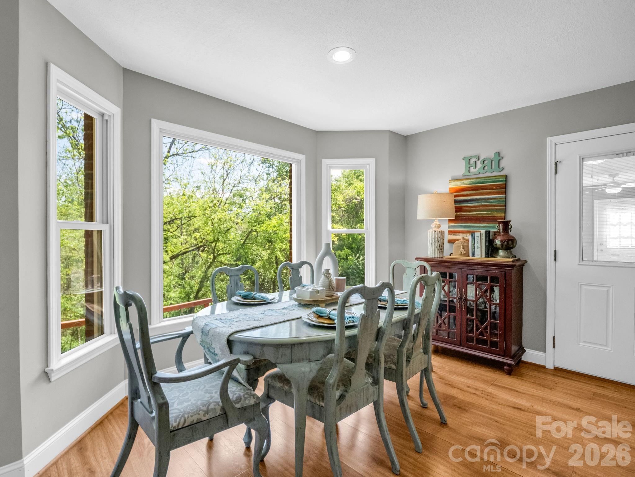 158 Shady Woods Lane Rutherfordton, NC 28139 - Photo 7 of 41 a view of a dining room with furniture window and outside view