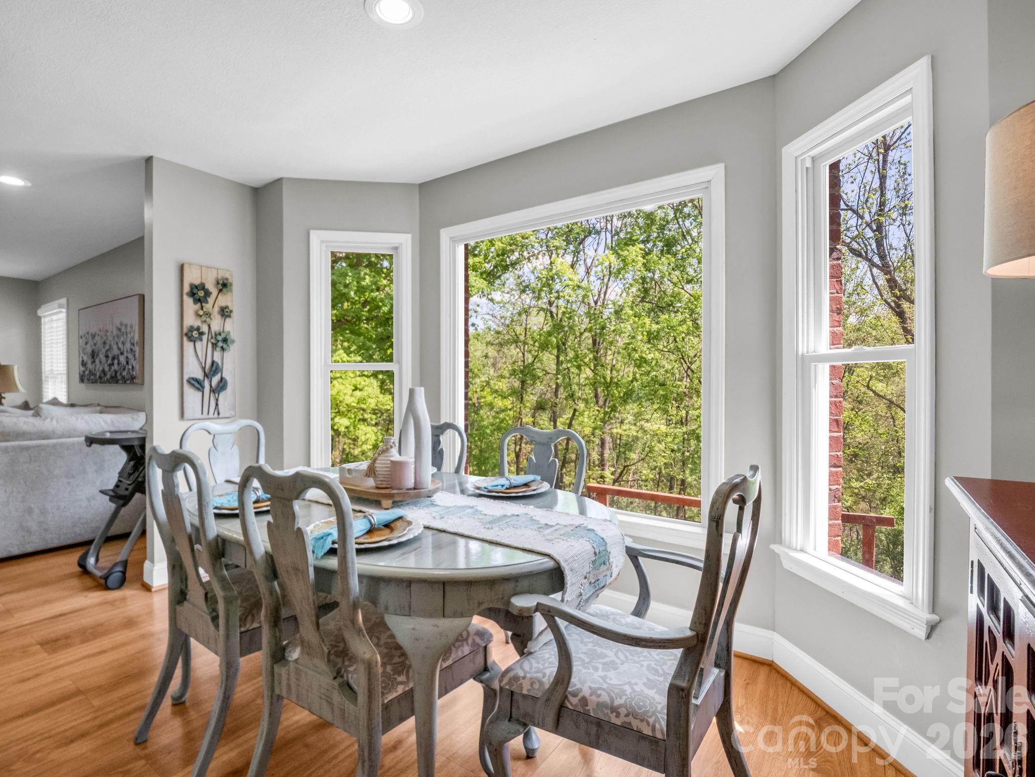 158 Shady Woods Lane Rutherfordton, NC 28139 - Photo 8 of 41 a view of a dining room with furniture window and outside view