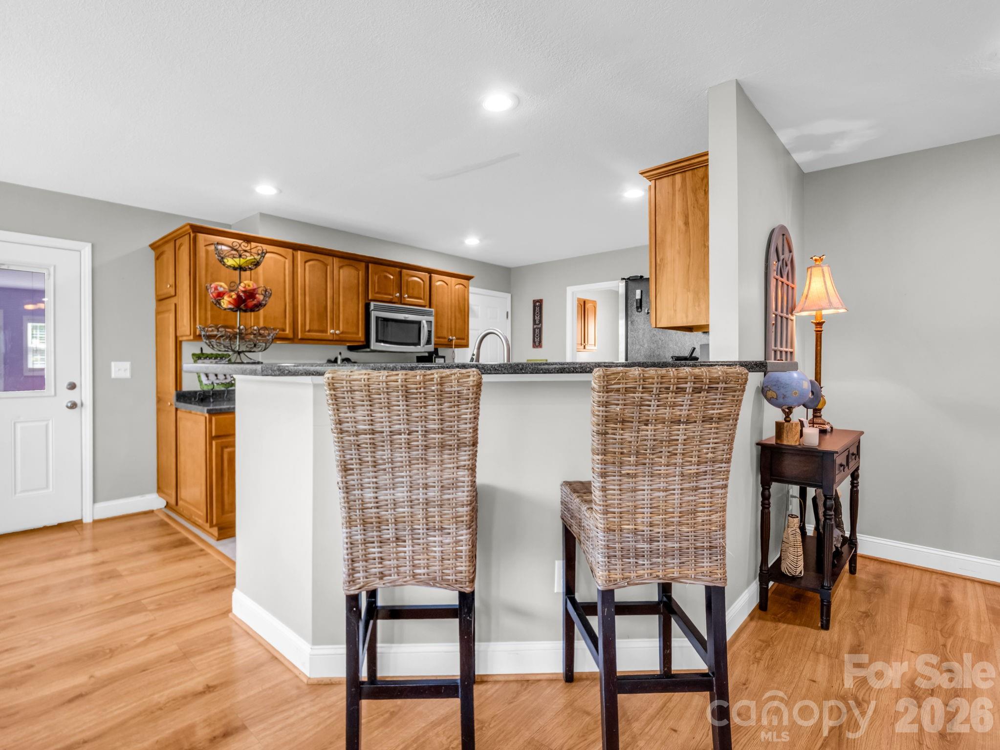 158 Shady Woods Lane Rutherfordton, NC 28139 - Photo 9 of 41 a dining room with furniture and wooden floor