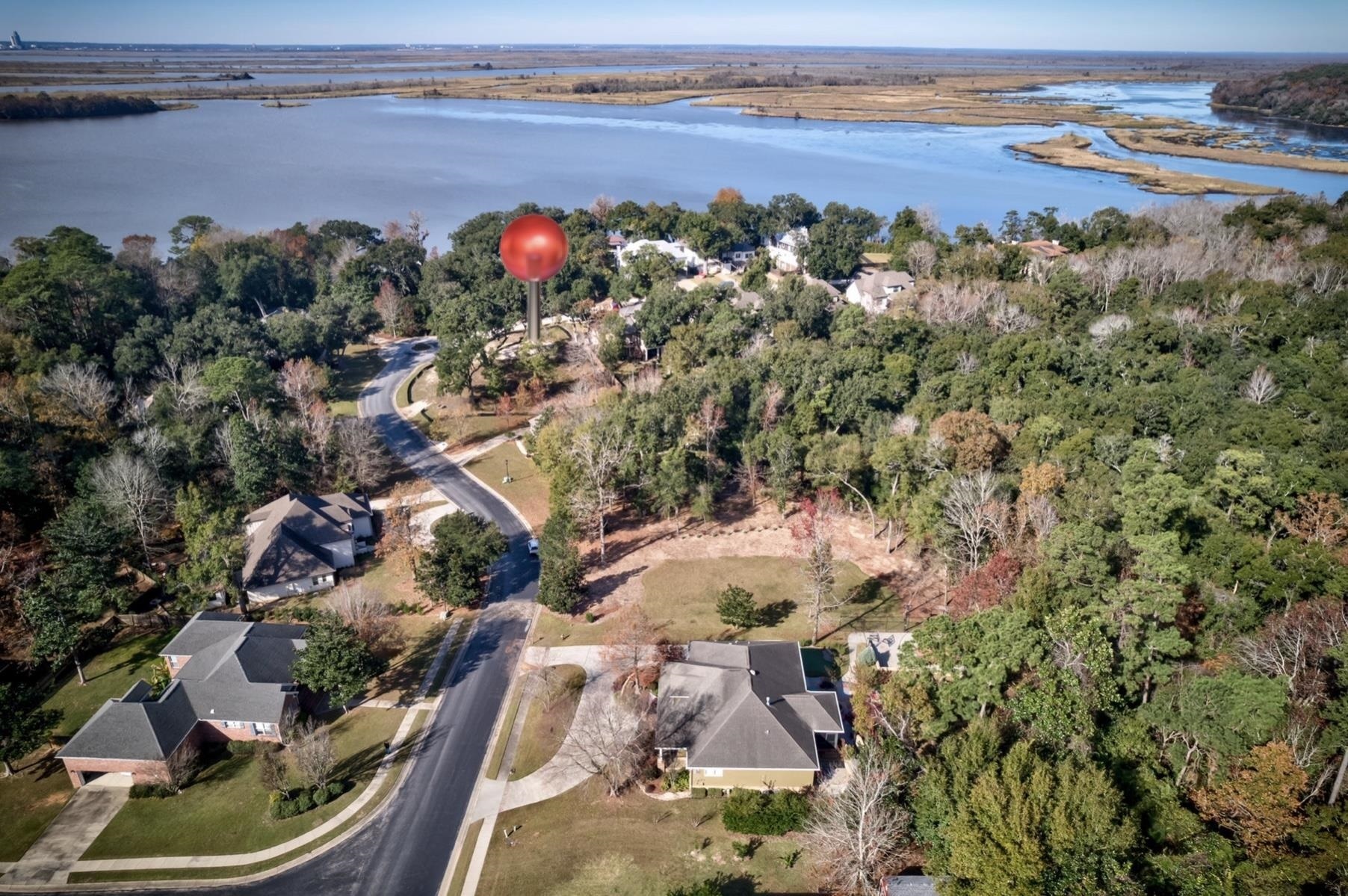0 Speckle Trout Route Daphne, AL 36527 - Photo 3 of 8 Aerial view of property's location featuring nearby suburban area and a nearby body of water