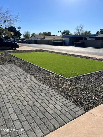 a view of a living room with a rug