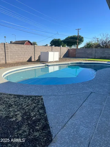 a view of a backyard of a house