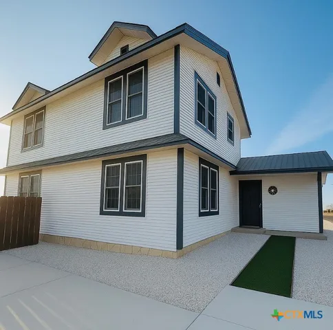 a front view of a house with windows