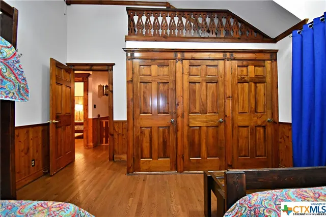 a bathroom with a sink a vanity and a mirror