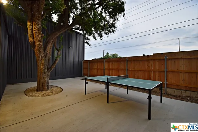 a view of outdoor space and tennis court