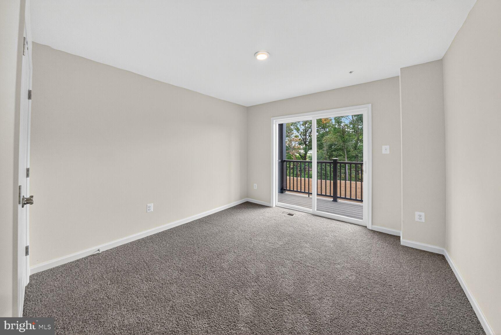 9990 A Justify Run Laurel, MD 20723 - Photo 13 of 28 a view of an empty room with a window