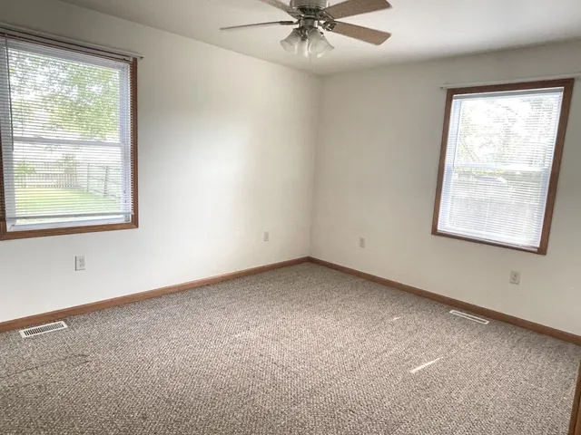 an empty room with a window