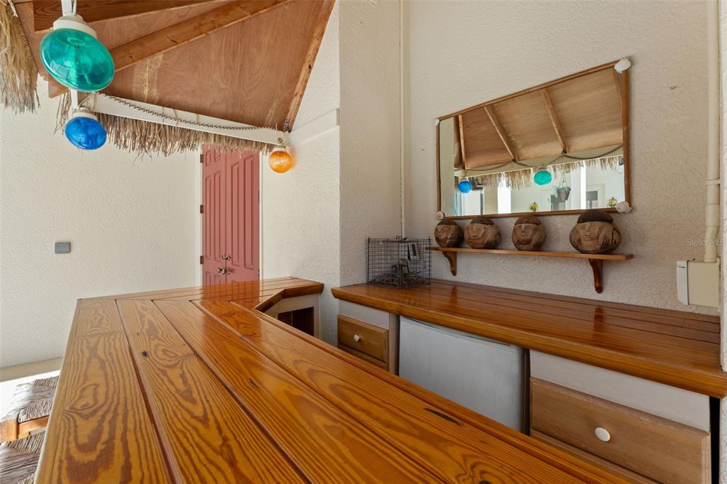 11405 Warm Wind Way Weeki Wachee, FL 34613 - Photo 16 of 46 a kitchen with a sink and a mirror