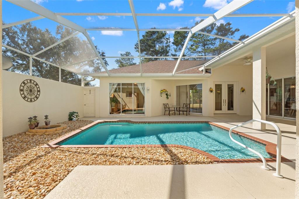 11405 Warm Wind Way Weeki Wachee, FL 34613 - Photo 3 of 46 a view of a house with backyard