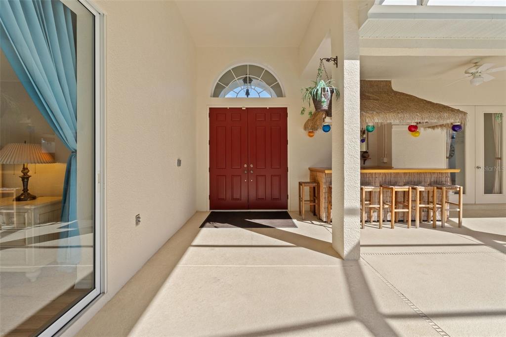 11405 Warm Wind Way Weeki Wachee, FL 34613 - Photo 6 of 46 a view of front door with a mirror