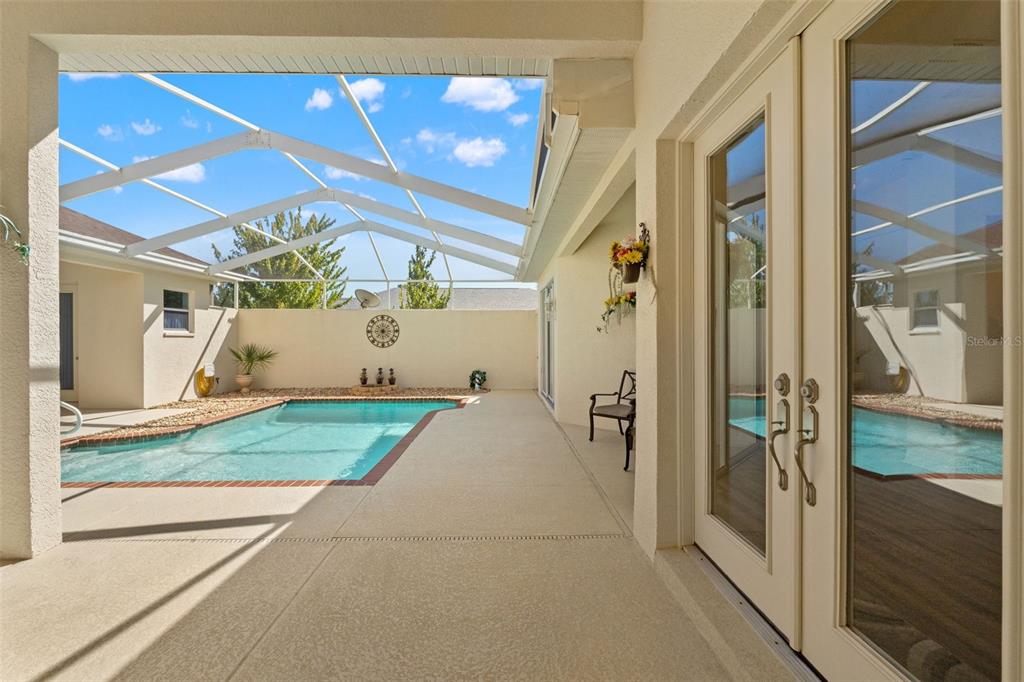 11405 Warm Wind Way Weeki Wachee, FL 34613 - Photo 9 of 46 a view of a porch