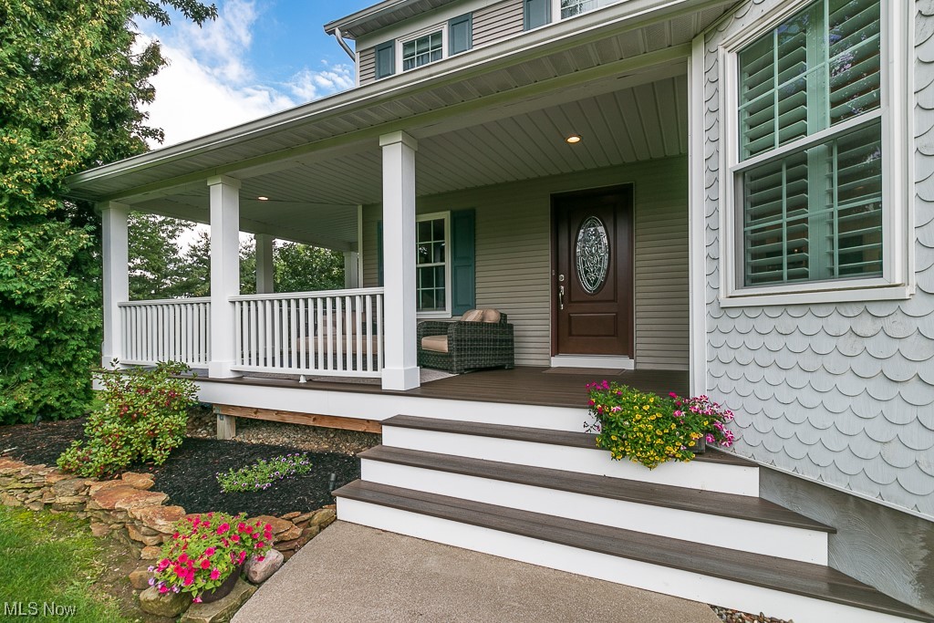 13880 Radcliffe Road Chardon, OH 44024 - Photo 3 of 35 Entrance to property featuring a maintainance free porch