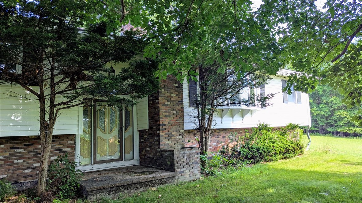 158 Cross Road Otego, NY 13825 - Photo 2 of 50 Side formal entrance to this split level home on 8
