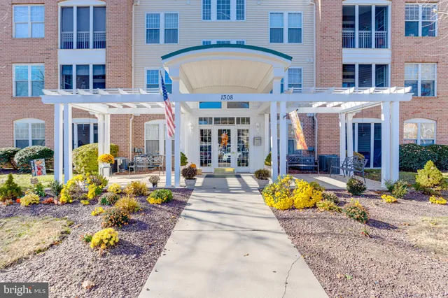 a view of a building with sitting area