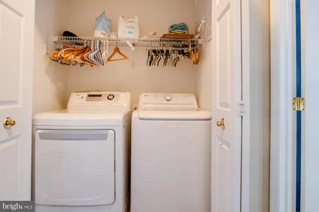 a view of a livingroom with furniture and a window