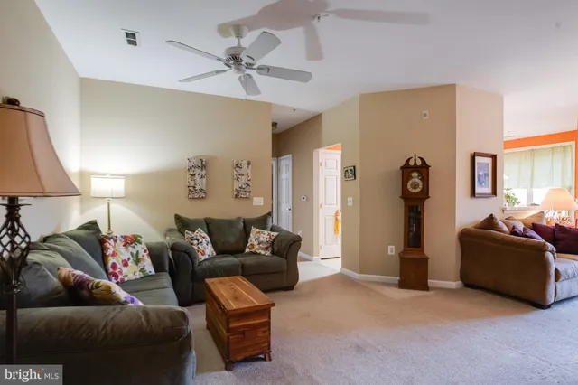 a living room with furniture and a couch