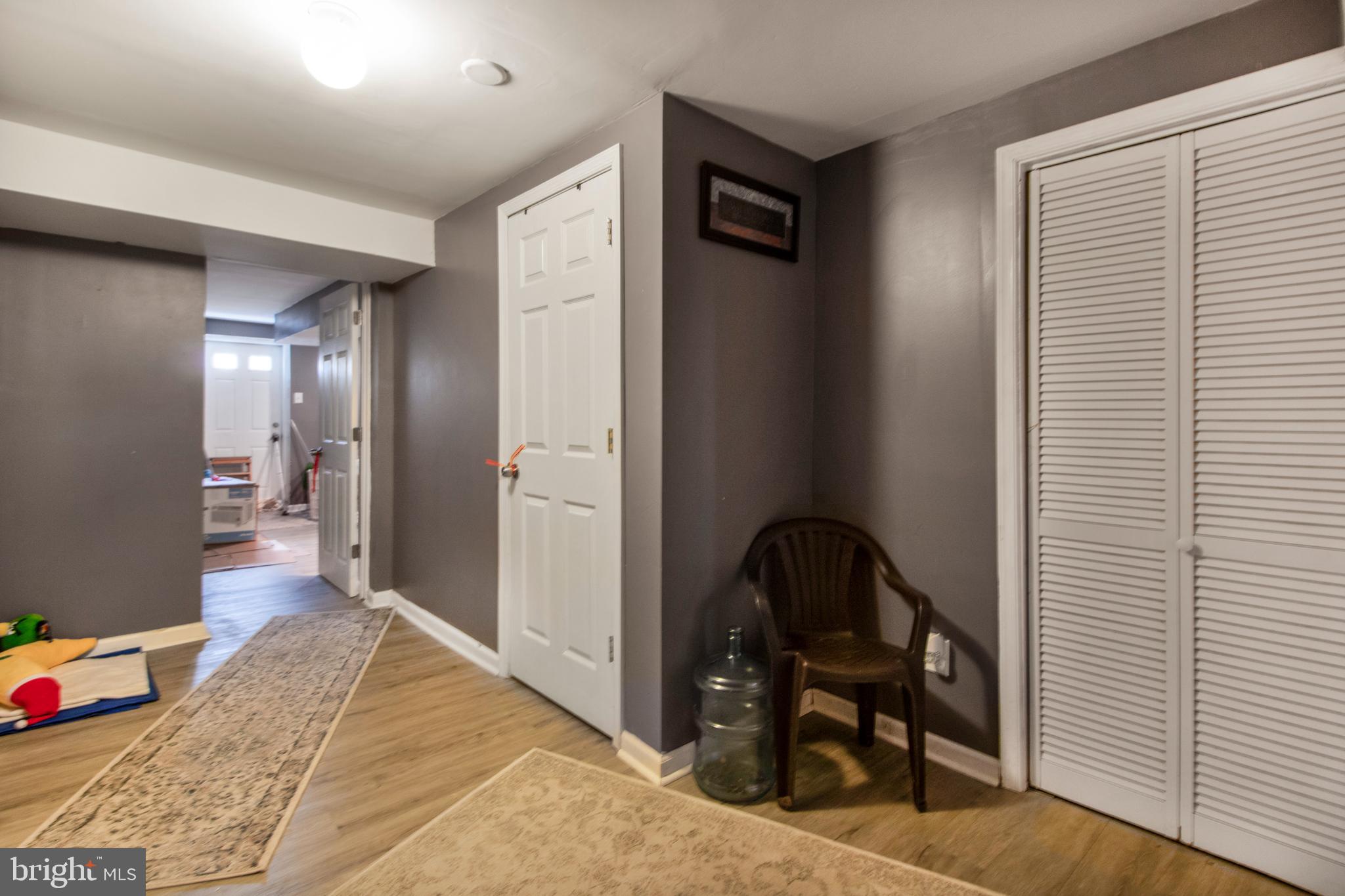 8803 Selina Road Randallstown, MD 21133 - Photo 43 of 53 Basement Hall / walkway