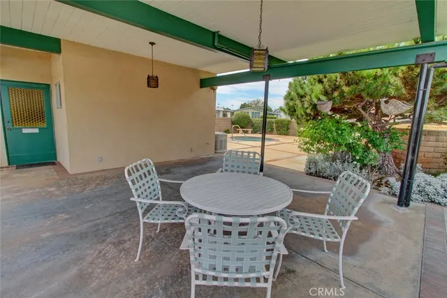 a backyard of a house with seating space