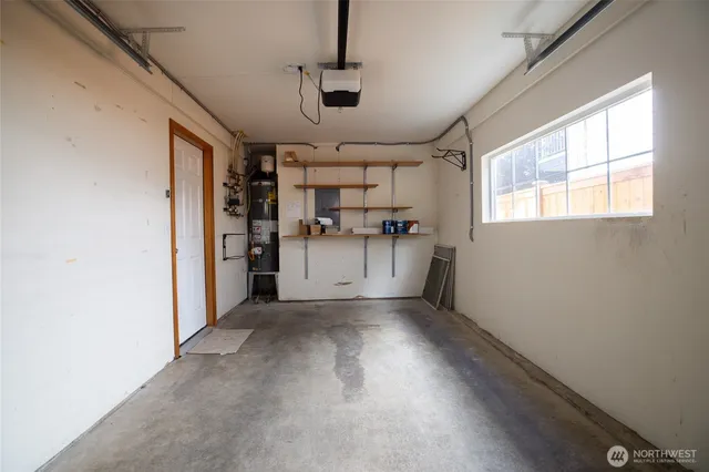 a view of a kitchen with a sink cabinet and a window