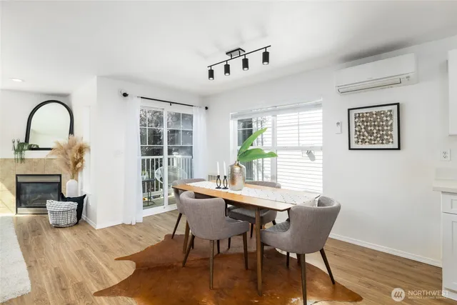 a view of a dining room with furniture window and outside view
