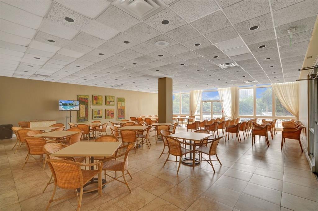 7441 Wayne Avenue, Unit 10C Miami Beach, FL 33141 - Photo 4 of 86 a outdoor space with lots of furniture and view of living room