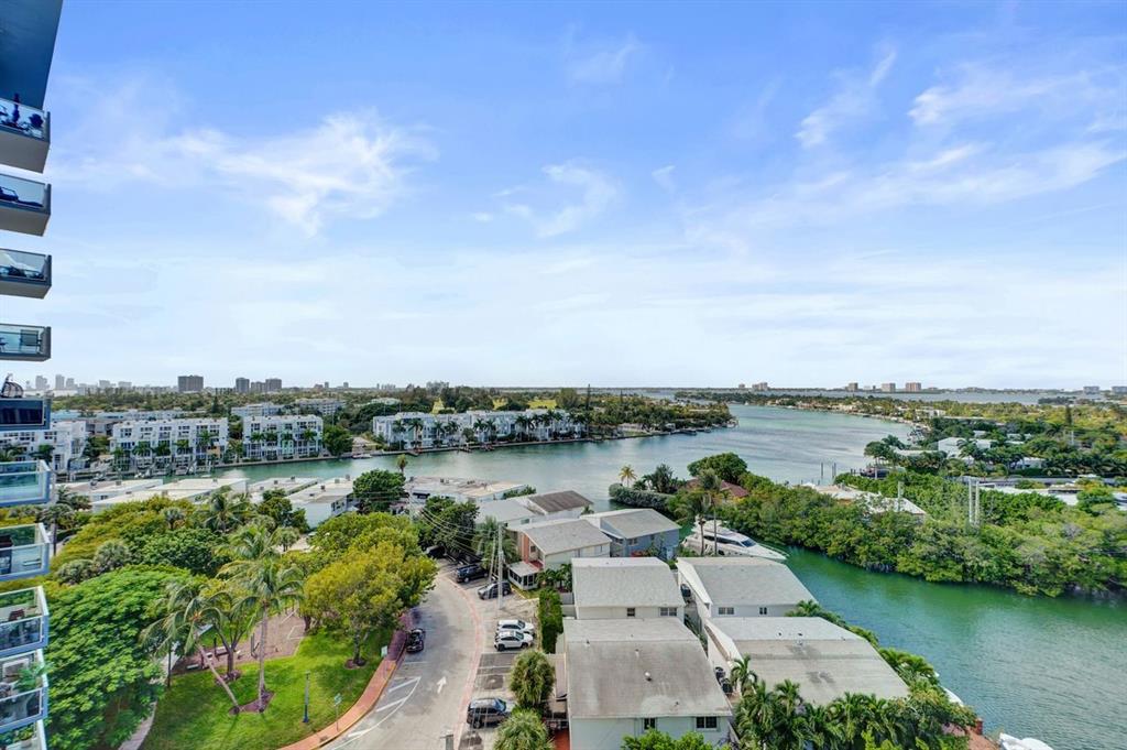 7441 Wayne Avenue, Unit 10C Miami Beach, FL 33141 - Photo 48 of 86 an aerial view of residential building and lake view