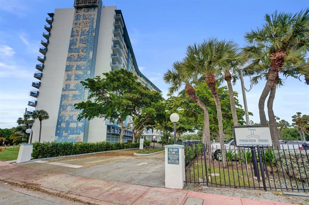 7441 Wayne Avenue, Unit 10C Miami Beach, FL 33141 - Photo 56 of 86 a front view of a house with tree s