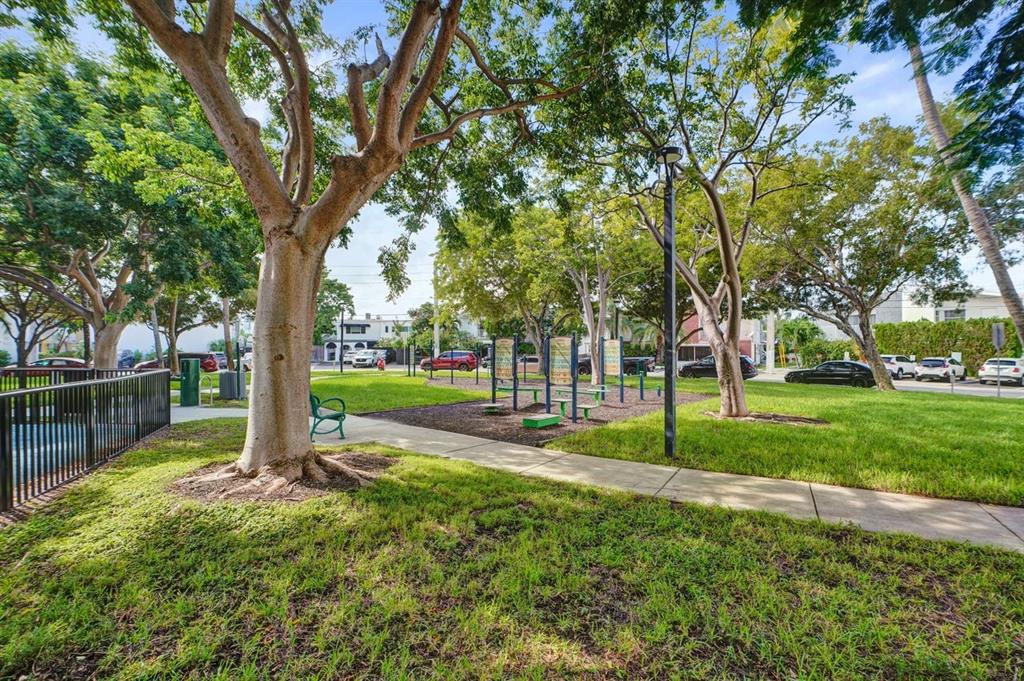 7441 Wayne Avenue, Unit 10C Miami Beach, FL 33141 - Photo 57 of 86 a view of a park with large trees