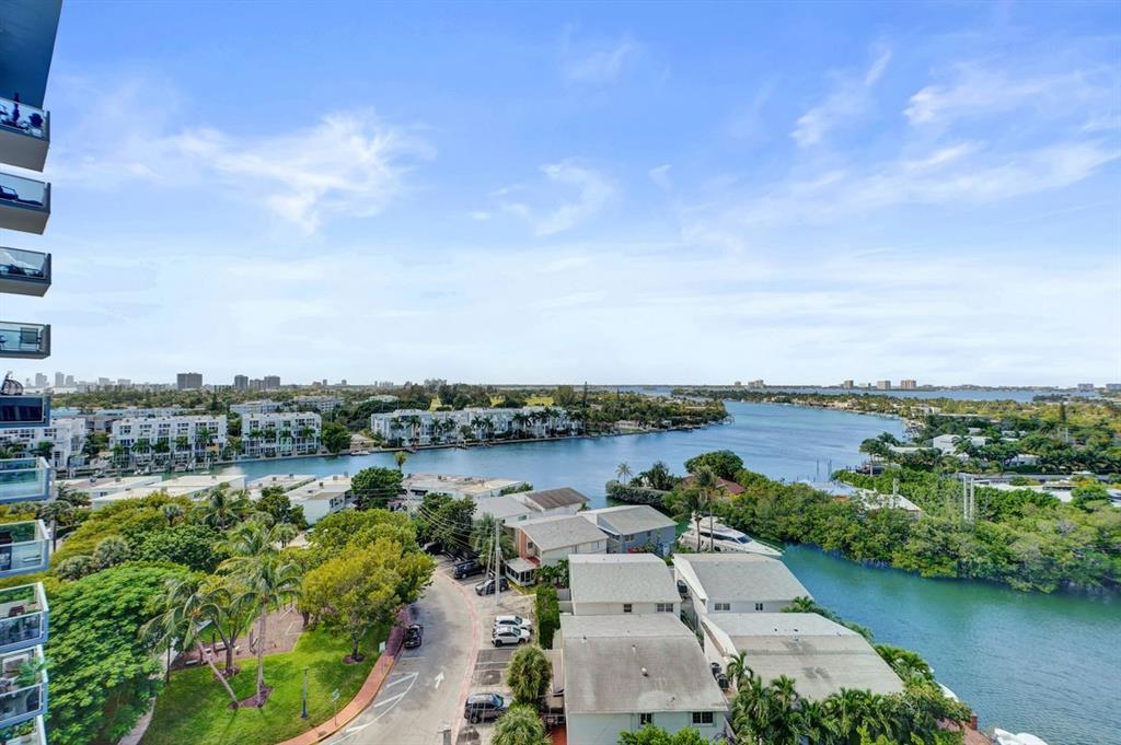 7441 Wayne Avenue, Unit 10C Miami Beach, FL 33141 - Photo 77 of 86 an aerial view of a house with a lake view