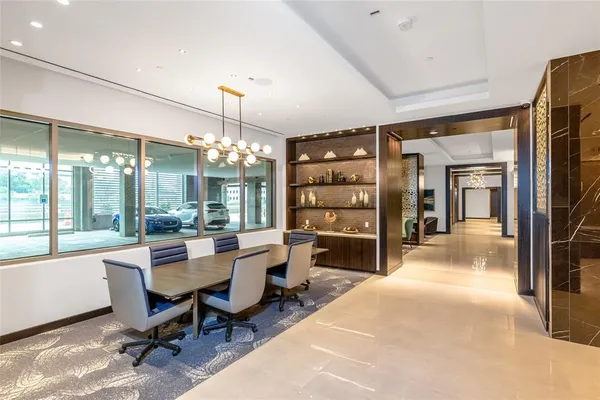 a view of a dining room with furniture window and outside view