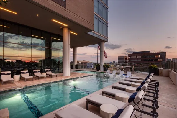 an outdoor space with patio furniture