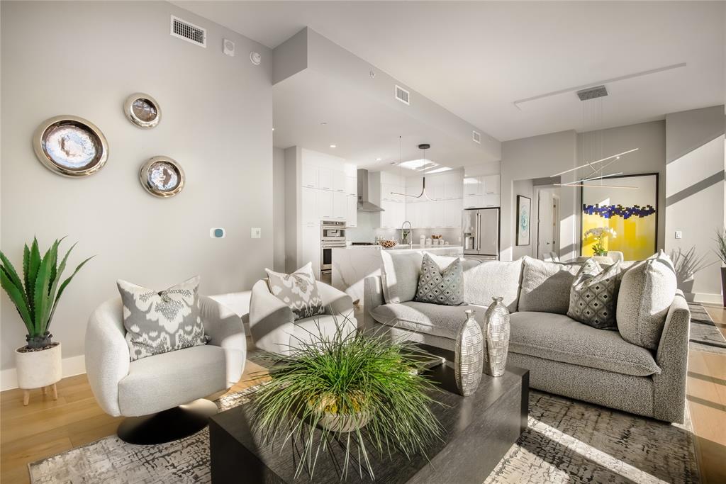 3031 Oliver Street, Unit 2007 Dallas, TX 75205 - Photo 8 of 29 a living room with furniture and a large window