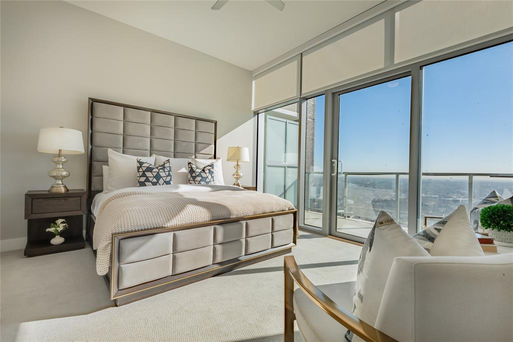 3031 Oliver Street, Unit 2007 Dallas, TX 75205 - Photo 10 of 29 a bedroom with a bed and a large window