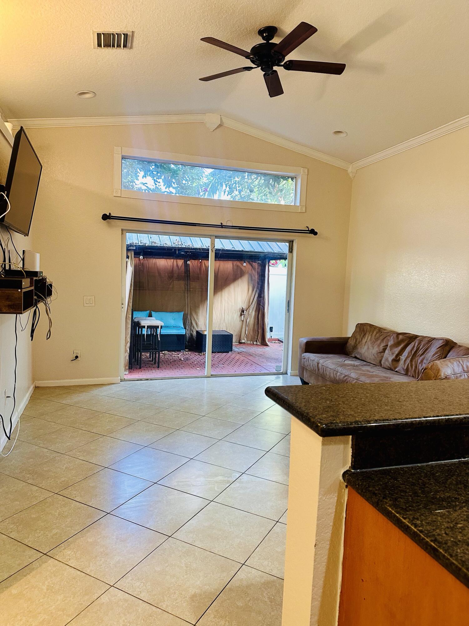 5200 Rising Comet Lane Greenacres, FL 33463 - Photo 15 of 50 a view of an entryway with a fireplace